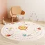 Tapis enfant rond avec un motif soleil au milieu