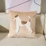 Coussin enfant kaki avec un appliqué en forme de chien 
