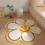 Tapis enfant en forme de fleur jaune et blanc souriant 