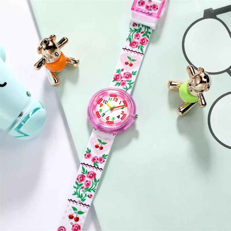 Montre enfant rose à motifs floraux