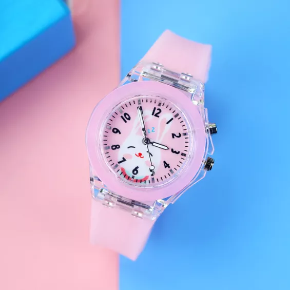 Montre enfant rose décorée d'un motif de lapin mignon