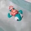 Jouet de bain en forme de tortue verte et rouge