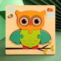 Puzzle enfant en bois en forme d'hibou coloré 