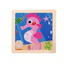 Puzzle enfant en bois avec une image d'hippocampe rose 