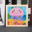 Puzzle enfant en bois avec une image de méduse rose 
