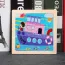 Puzzle enfant en bois avec une image de bateau coloré 