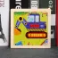 Puzzle enfant en bois avec une image de pelleteuse colorée
