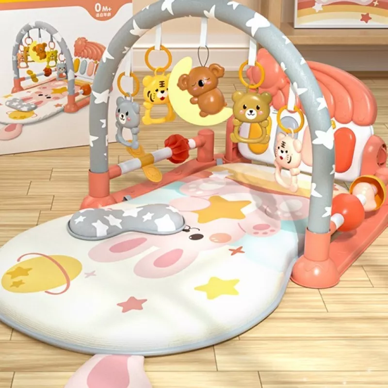 Tapis d'éveil musical avec des hochets en forme d'animaux